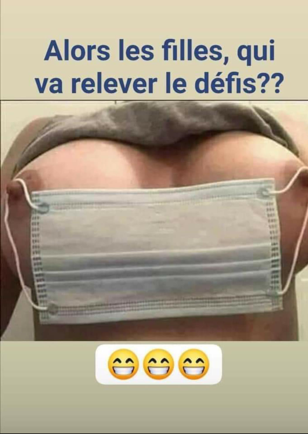 Blague   masque sur les seins tenu par les tetons